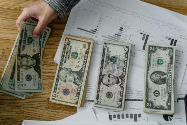 Money on table for attorney cost